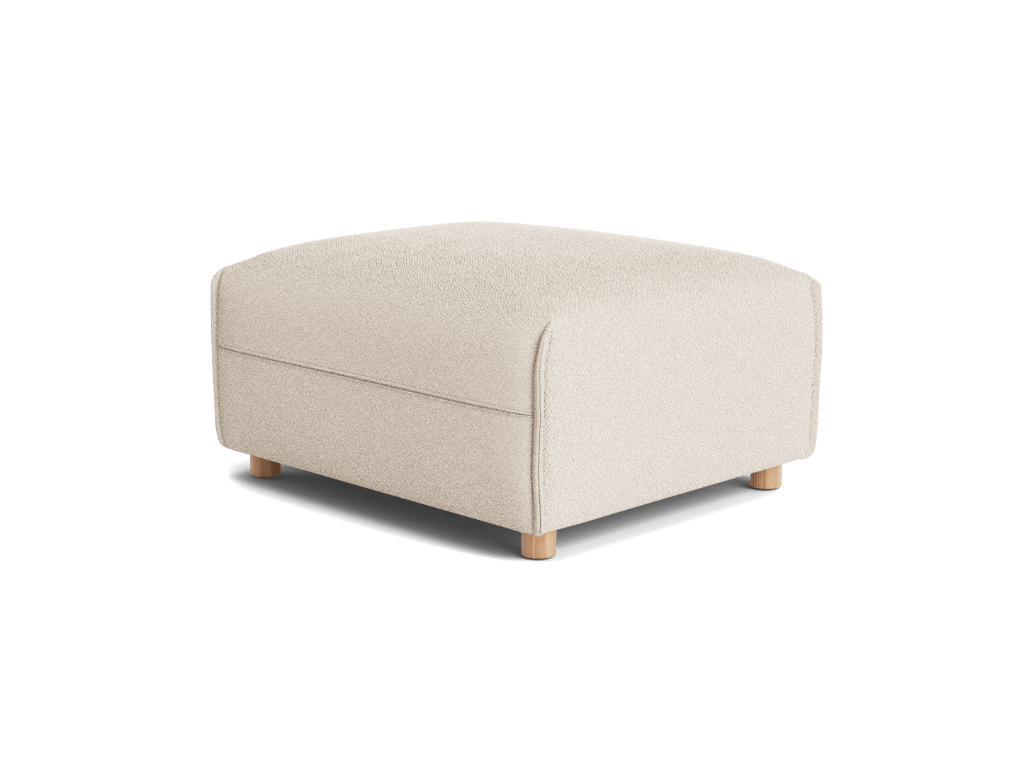 Luxurious upholstered ottoman in cream boucle fabric with elegant curved edges and sturdy wooden legs; ideal for contemporary living spaces.