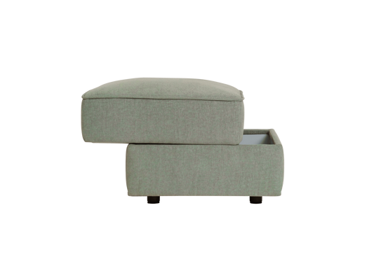 A light green ottoman with a removable top cushion, featuring a hidden storage drawer, resting on small dark wooden legs.
