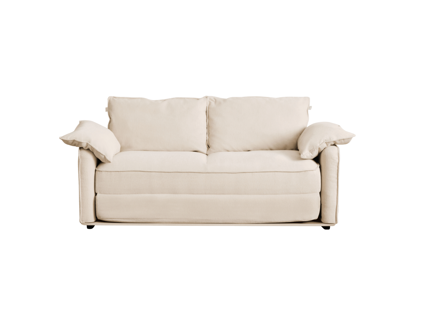 A cream-colored, plush sofa with two large back cushions and two side pillows, resting on a simple base.