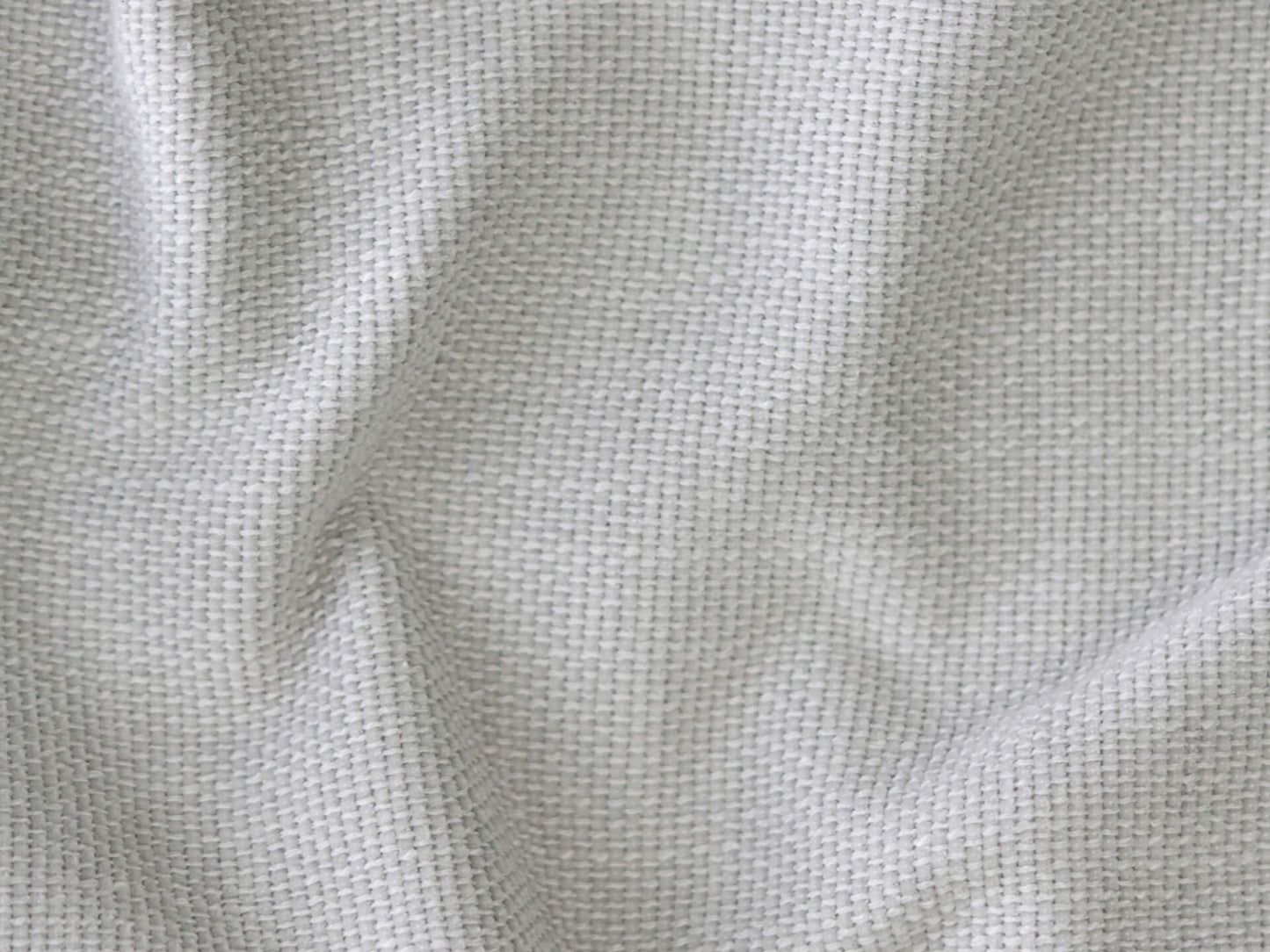 Light grey textured fabric with a fine weave, ideal for upholstery. Soft and elegant, providing a modern aesthetic perfect for high-end interior design settings.