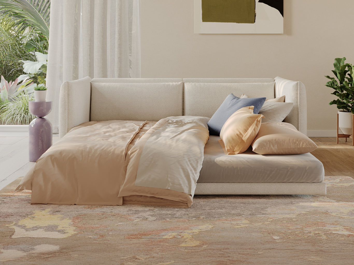 A light beige sofa with a cream blanket and soft cushions in blue and peach shades, beside a purple vase and green plants.