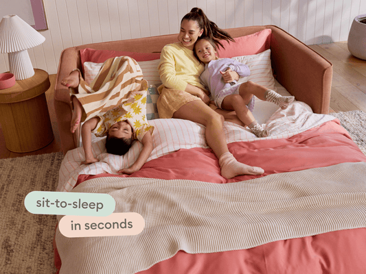 family lounging in a sleeper sofa