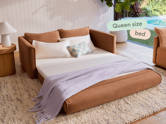 laid out queen size sofa bed