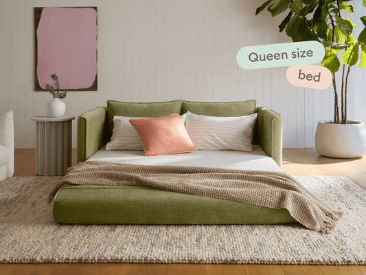 green laid out queen size sleeper sofa
