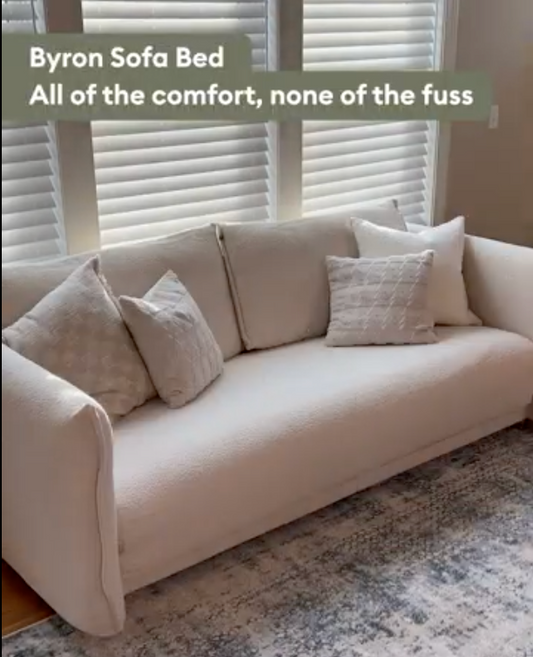 a white sofa bed couch
