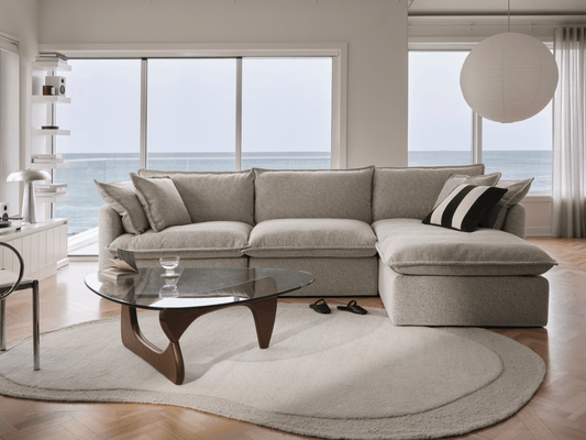 gray modular sectional against a window backdrop