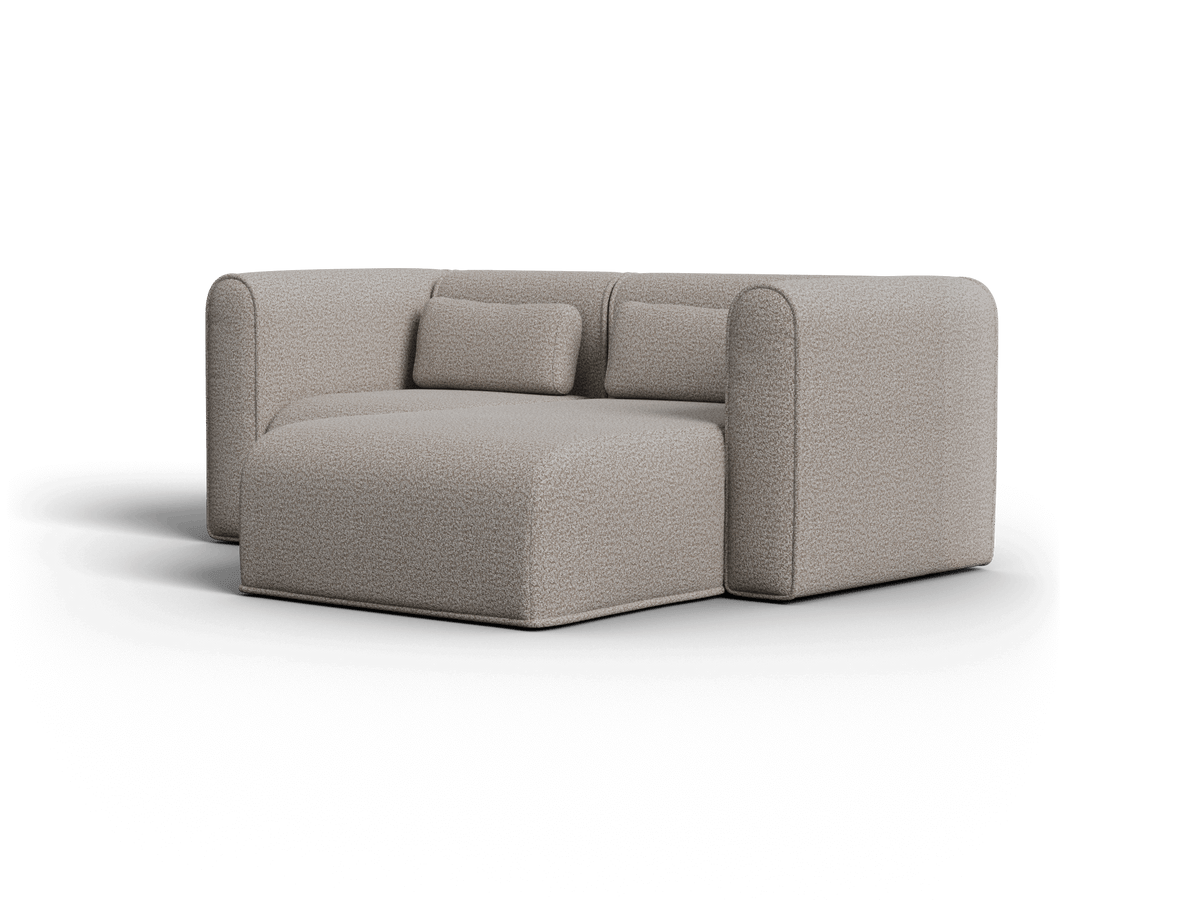 Elegant beige boucle sofa with clean lines and plush cushions, set in a modern living space. Features a left-facing chaise for premium comfort.