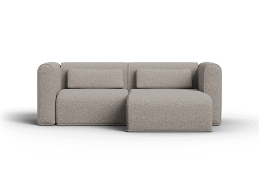 Premium beige modular sofa featuring a soft, textured fabric and minimalist design, set in a contemporary living space for understated elegance.