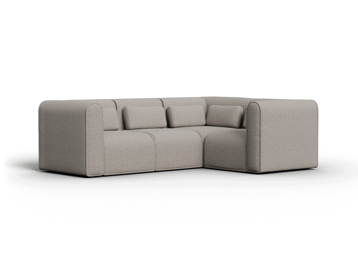 Luxurious grey modular sofa, upholstered in premium textured fabric. Features plush cushions and streamlined design, ideal for modern living spaces.