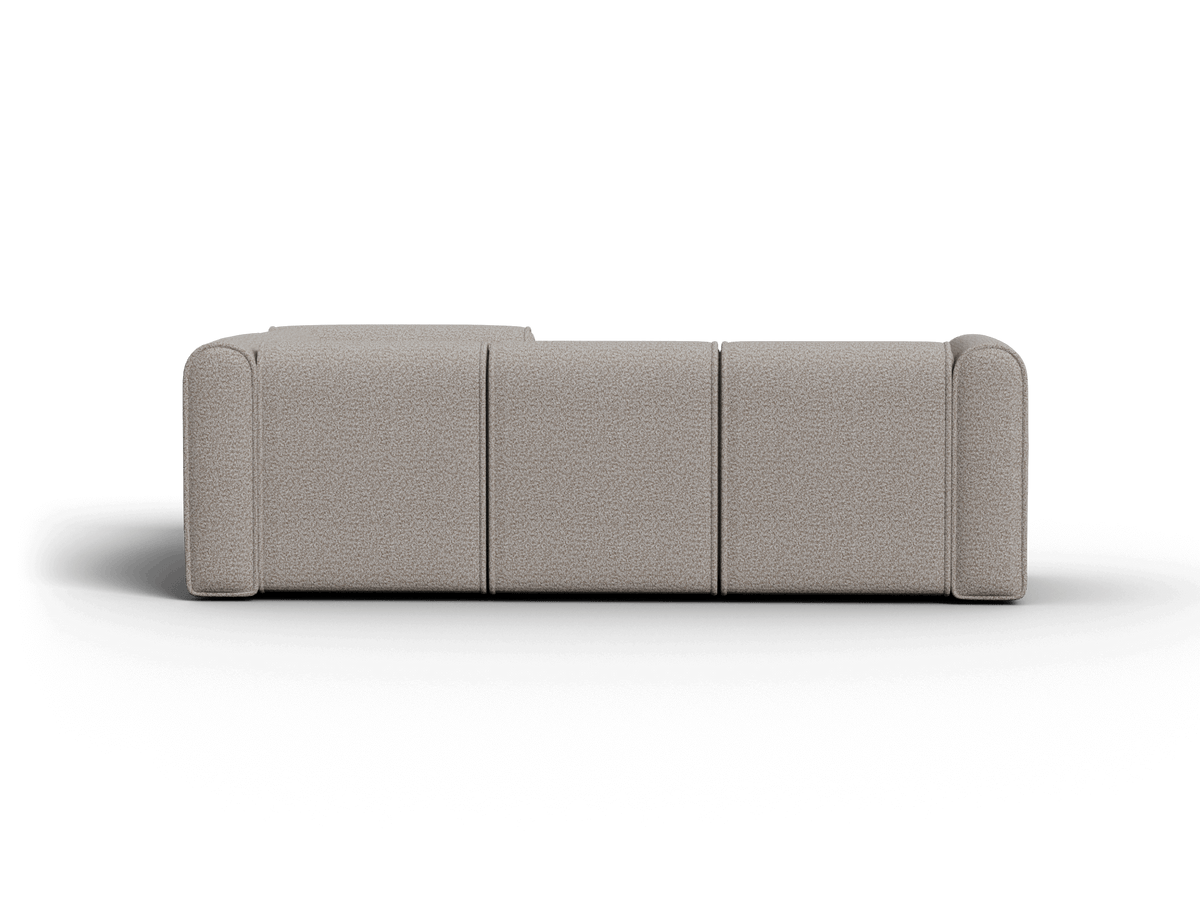 Modern beige three-seater sofa with a textured fabric finish. Features clean lines and plush cushions, perfect for sophisticated living room settings.
