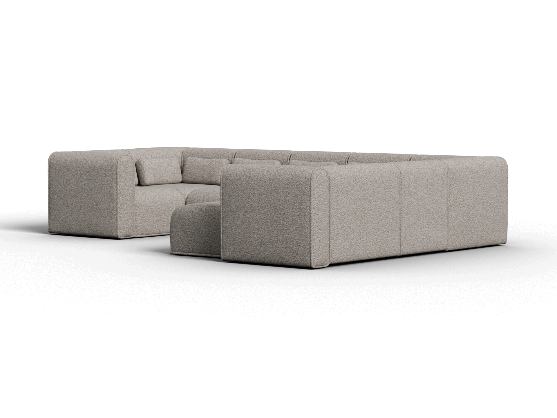 Luxurious grey modular sectional sofa in premium fabric, featuring rounded edges and deep seating. Perfect for modern, sophisticated living spaces.