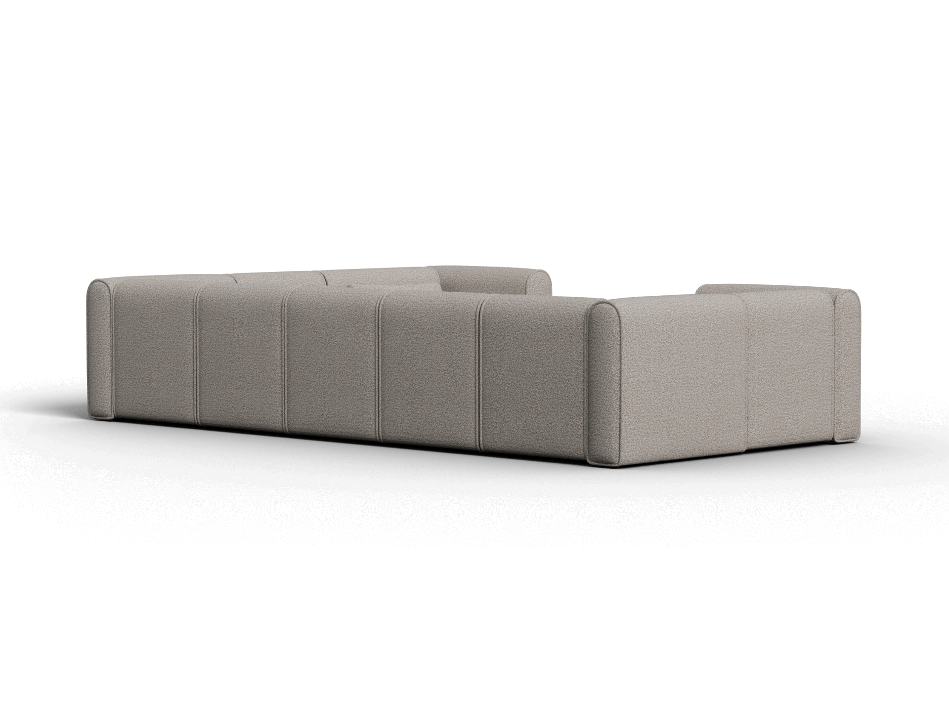 Luxurious modular sofa in premium grey fabric, featuring deep, plush seating and sleek, rounded edges. Ideal for a contemporary living space.
