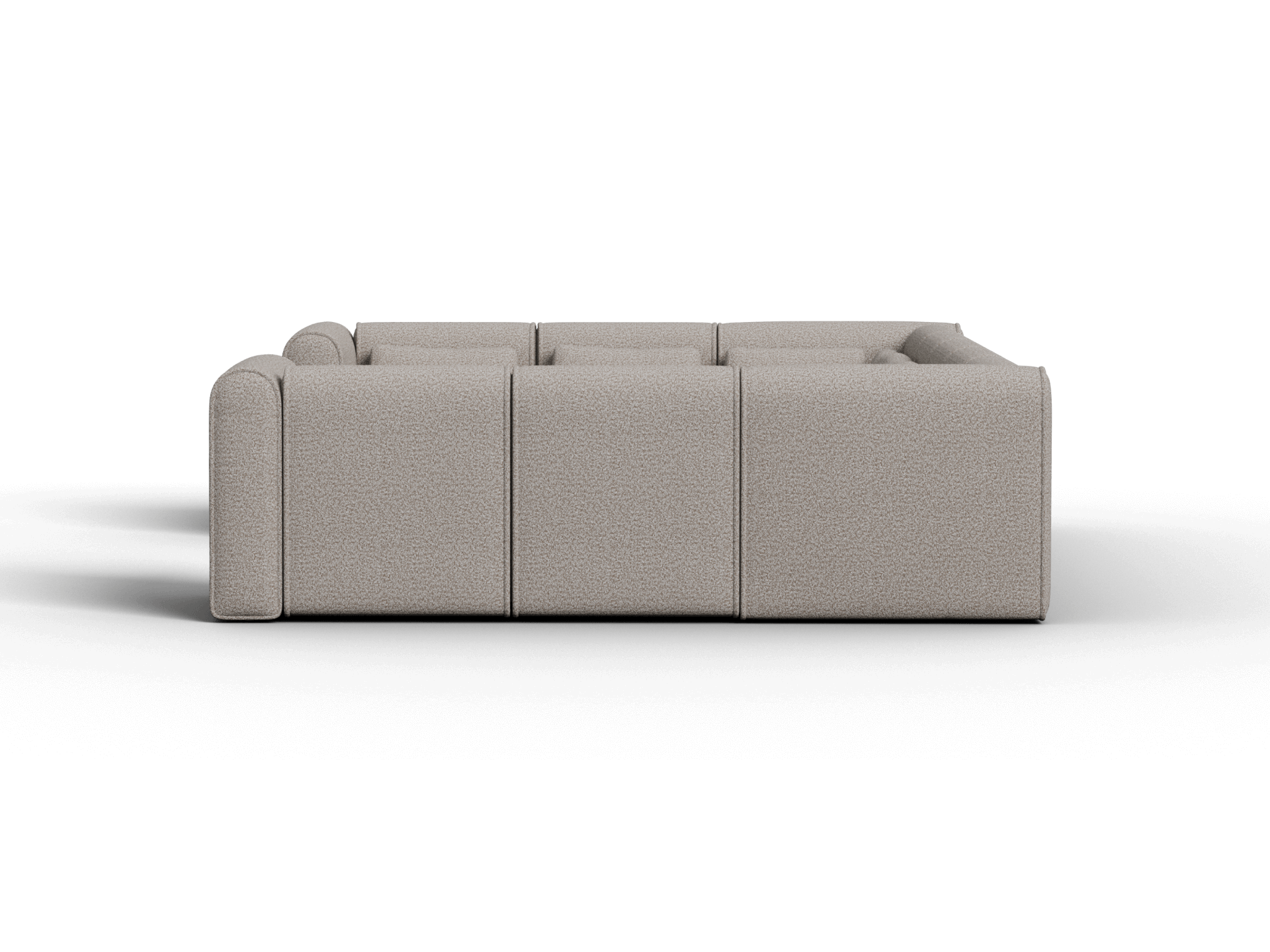 Premium beige modular sofa in plush fabric, featuring deep seating and seamless lines, set in a sophisticated, contemporary living space.