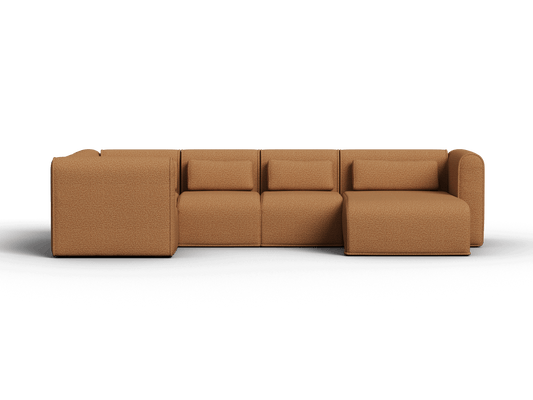 Luxe modular sofa in rich tan fabric, featuring plush cushions and a chaise lounge. Perfect for contemporary living rooms with premium aesthetics.