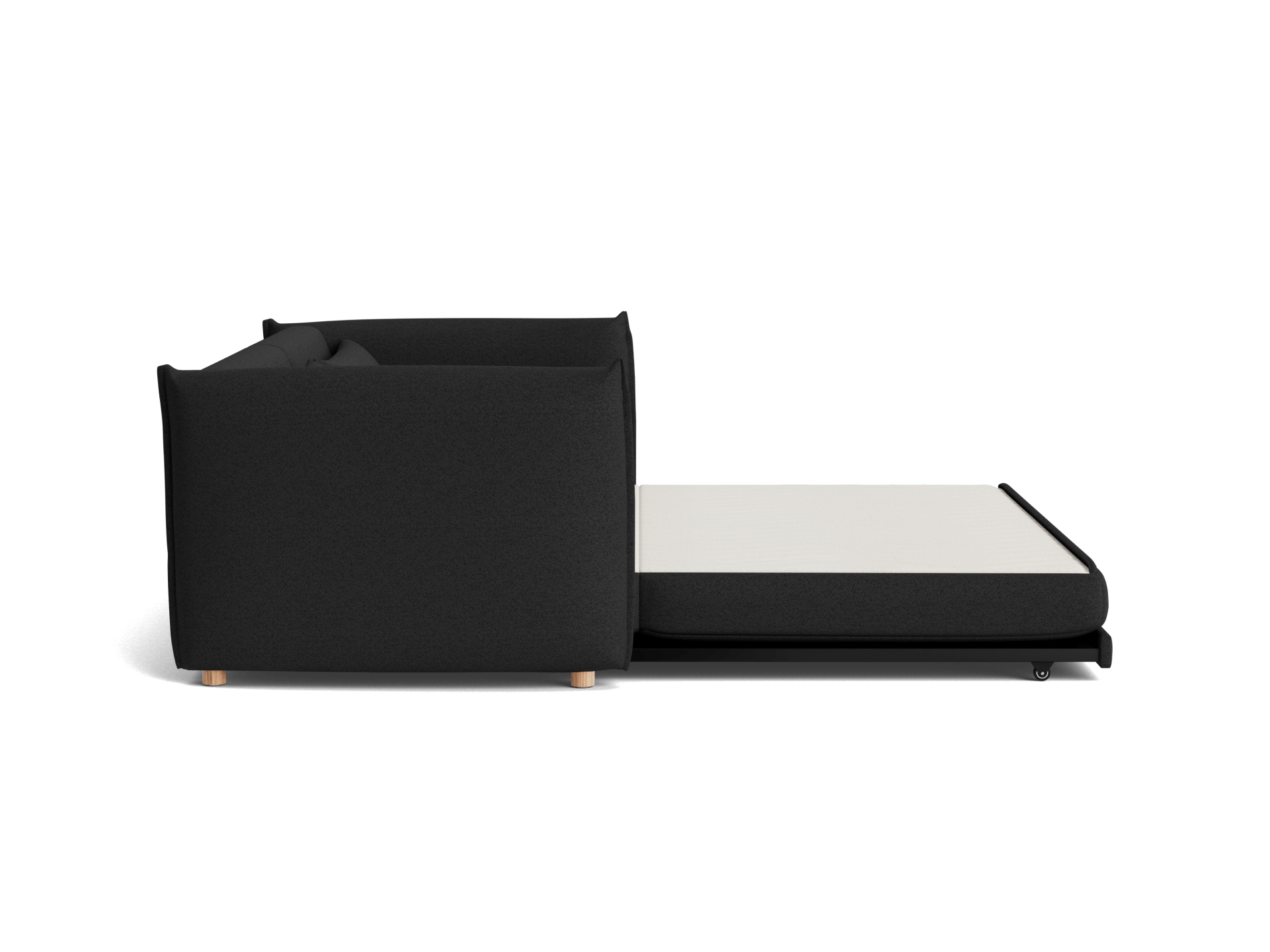 A black sofa with a minimalist design, featuring wooden legs, and a pull-out white mattress extension.