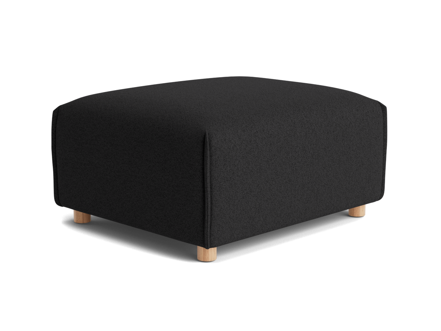 A black ottoman with a textured fabric surface and light wooden legs, featuring a rounded shape and no visible seams.