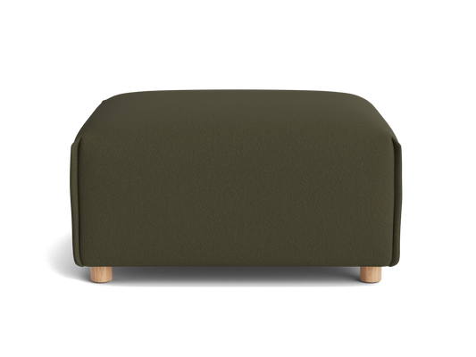 A rectangular olive green ottoman with rounded edges, resting on light wooden legs, set against a black background.