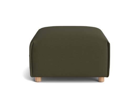 A rectangular olive green ottoman with rounded corners and light wooden legs, set against a black background.