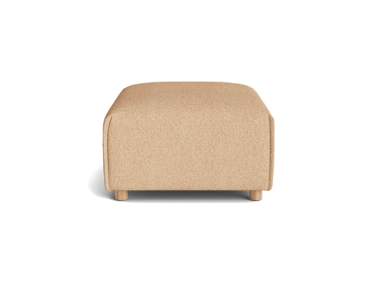 A beige fabric ottoman with rounded corners and wooden legs, viewed from the front against a transparent background.