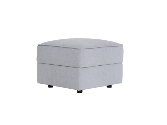 A light grey upholstered ottoman with a cushioned top and black legs, featuring a boxy shape and smooth texture.