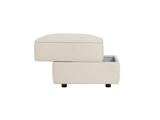 A light beige ottoman with a removable top, revealing a storage compartment below. It stands on short, black legs.