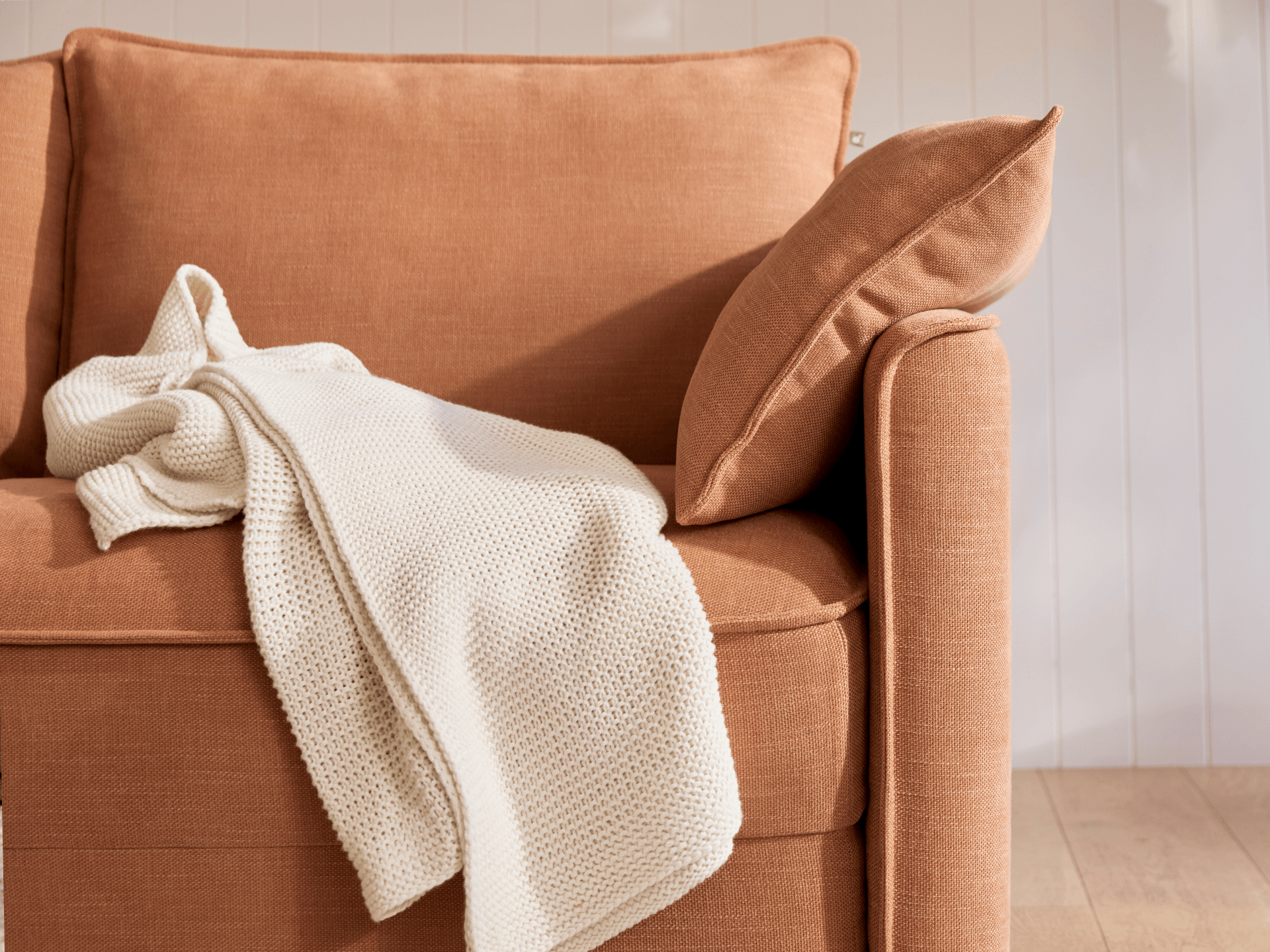 Koala Cushy Sofa Bed in terracotta close-up detail of fabric and stitching