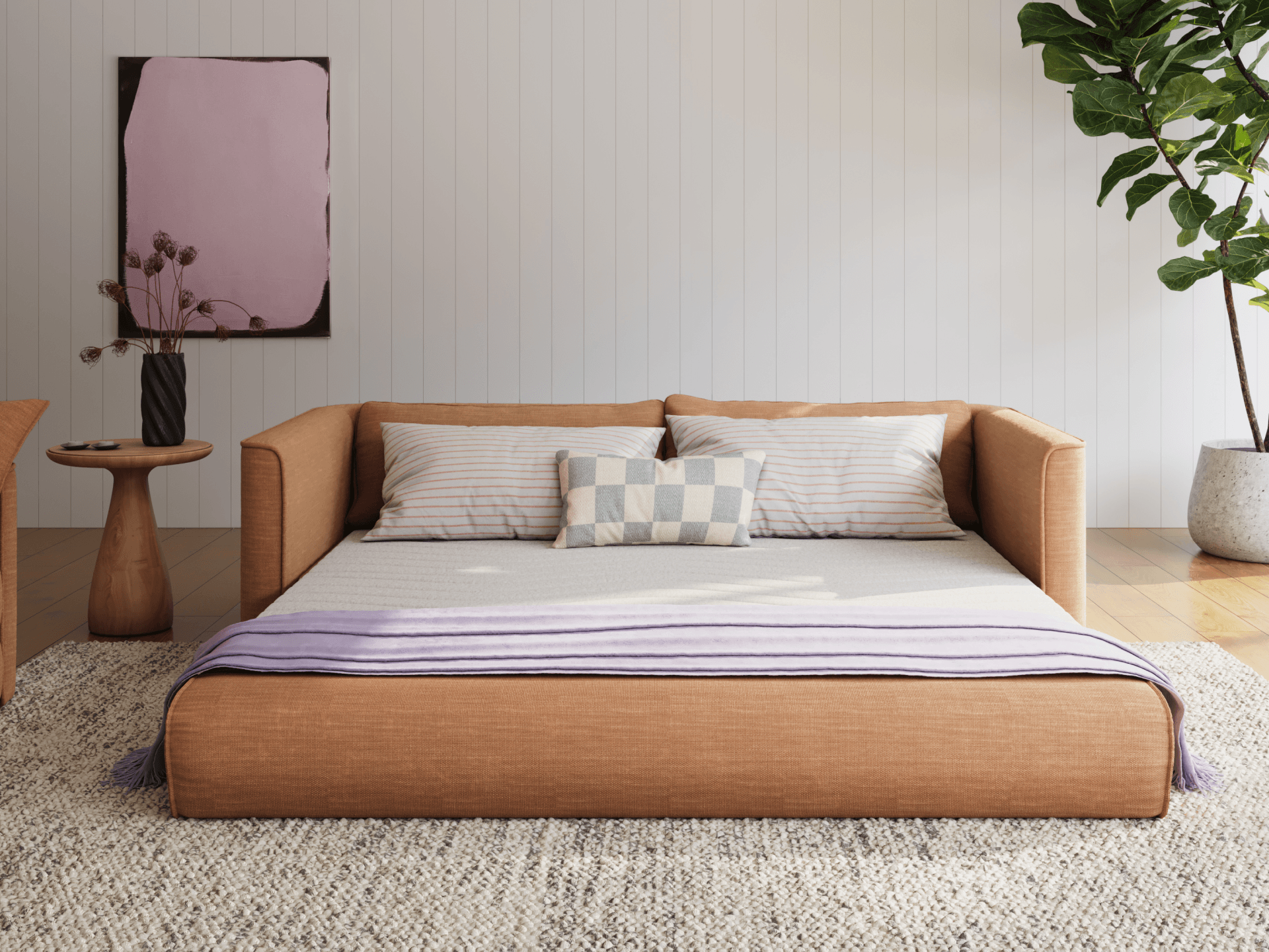 Koala Cushy Sofa Bed in terracotta unfolded into bed mode in room setting