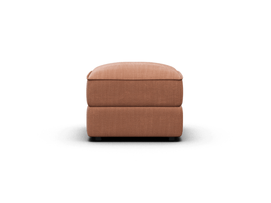 Luxurious ottoman featuring rich terracotta fabric, plush cushioning, and sleek design. Perfect for modern living rooms or elegant lounge settings.