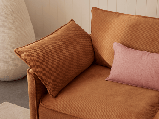 Koala Sofa Bed King in terracotta corduroy close-up with washable changeable fabrics text overlay