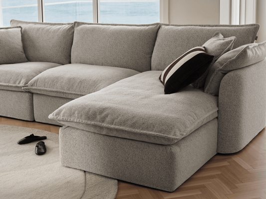 Koala Tamarama 3-section chaise modular sofa in Aussie Latte, linen scatter cushions with sunlit art books