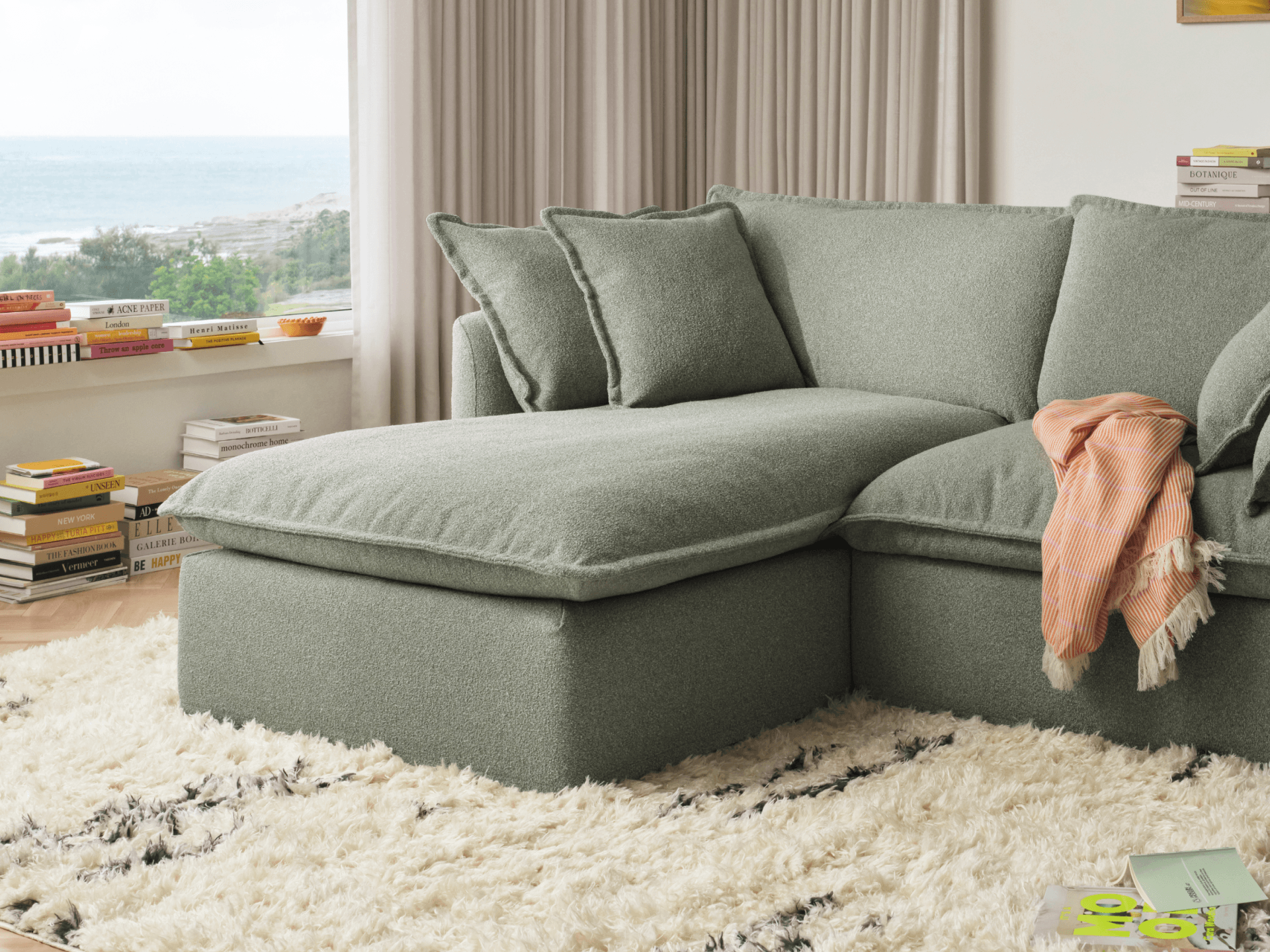 Koala Tamarama 4-section chaise modular sofa in Frosty Grass, with monstera plant and Noguchi glass table