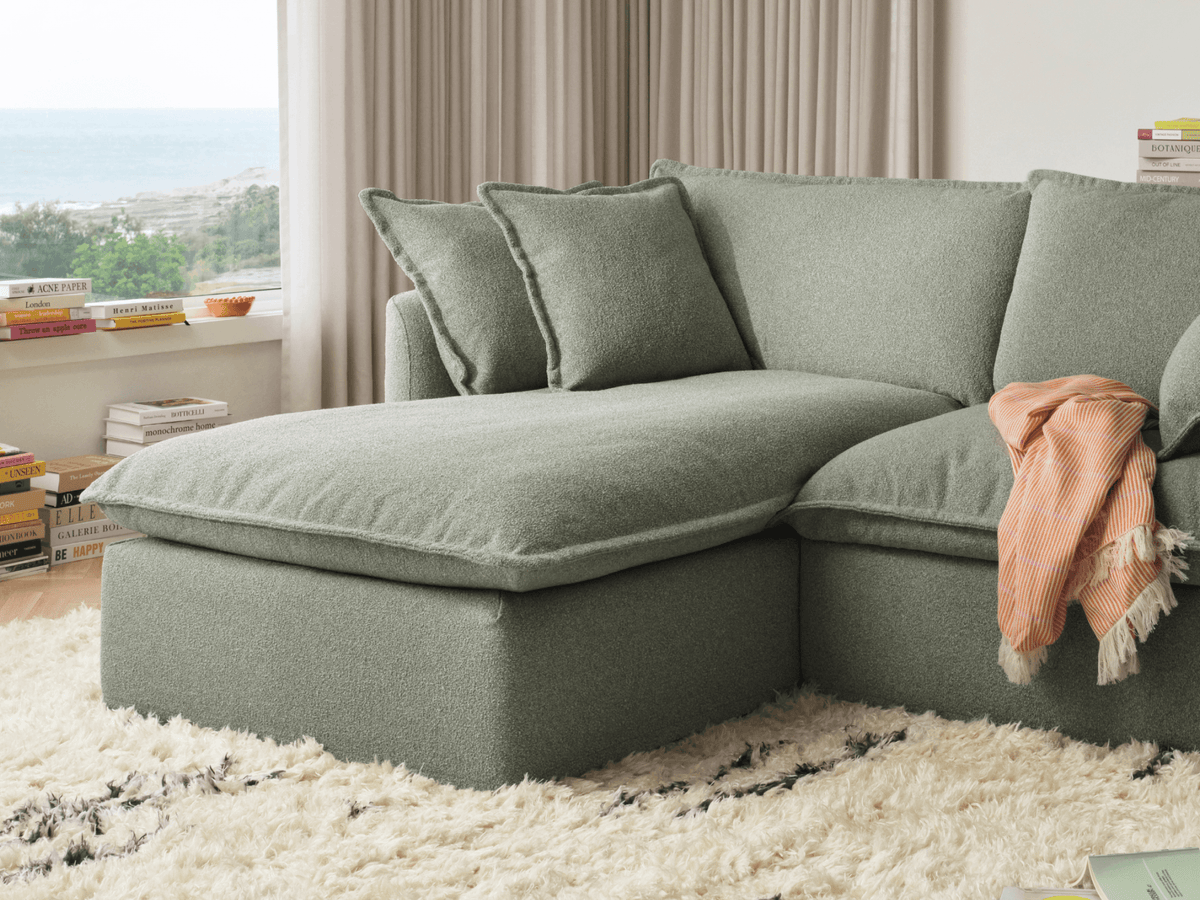Koala Tamarama 4-section chaise modular sofa in Frosty Grass, with monstera plant and Noguchi glass table