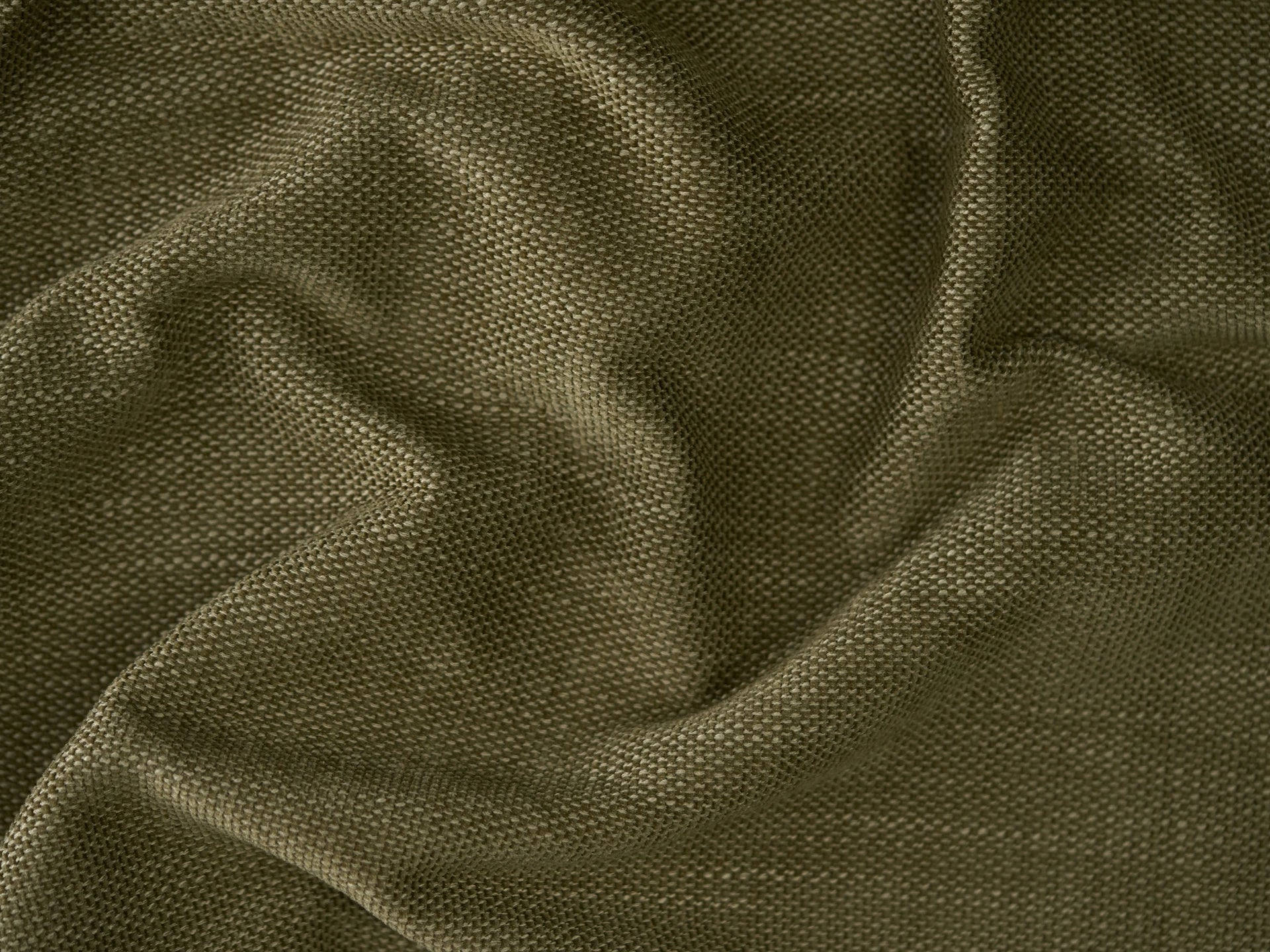 Close-up of textured green fabric