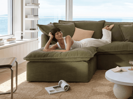 Koala Tamarama 2-section chaise modular sofa in Forest Walk, with monstera plant and terracotta velvet cushion