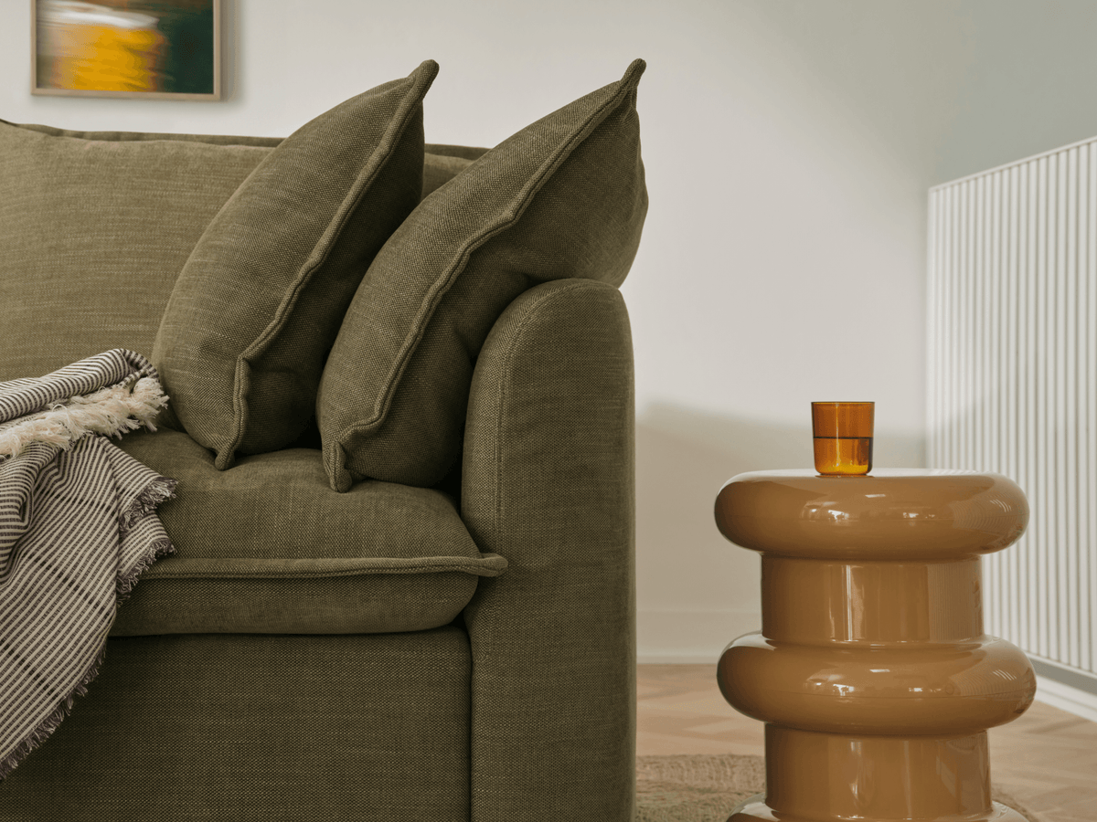Koala Tamarama 3-section chaise modular sofa in Forest Walk, linen scatter cushions with sunlit art books
