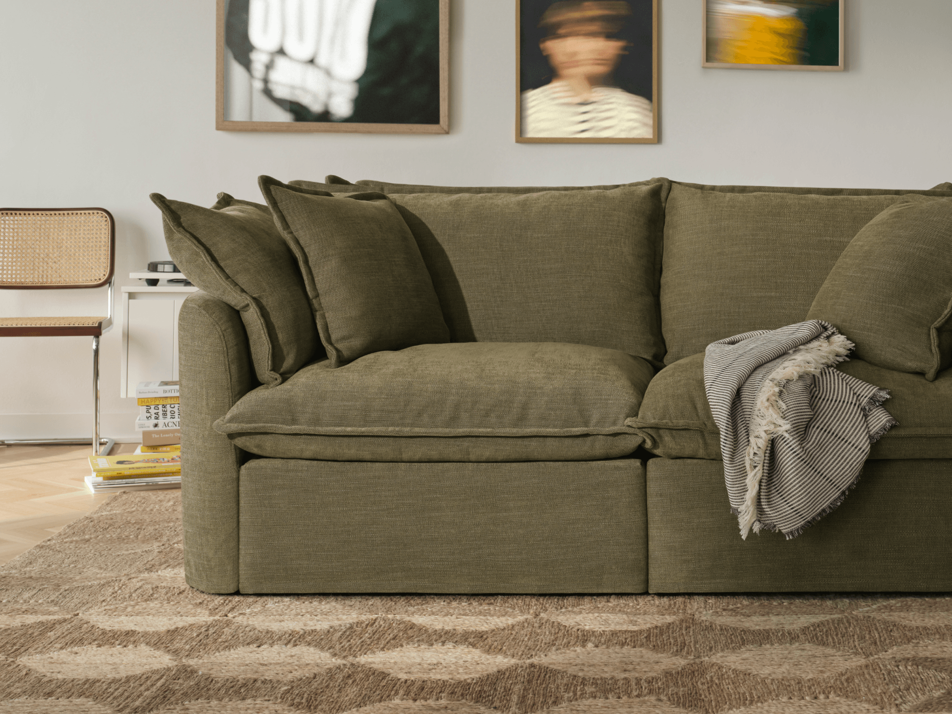 Koala Tamarama 3-section modular sofa in Forest Walk, with terracotta velvet cushion and city view
