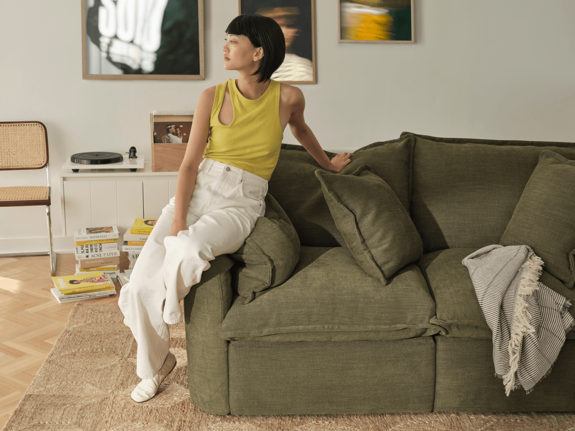 Koala Tamarama 6-section U-shape sectional in Forest Walk, corner detail with terracotta cushion and wavy lamp