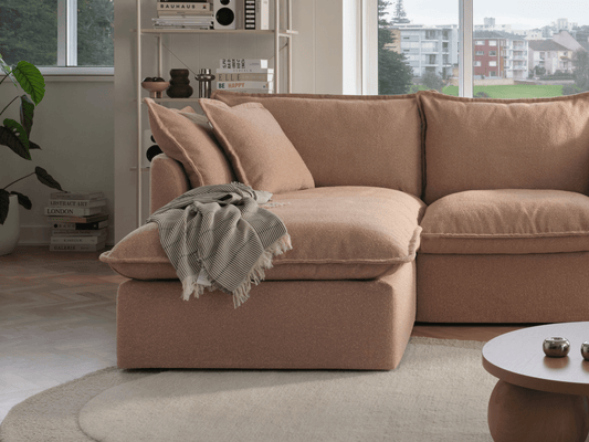 Koala Tamarama 2-section chaise modular sofa in Pebble Beach, with monstera plant and terracotta velvet cushion