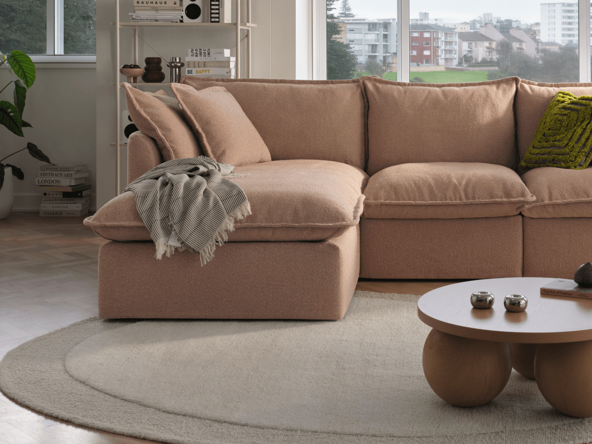 Koala Tamarama 3-section chaise modular sofa in Pebble Beach, with monstera plant and Noguchi glass table