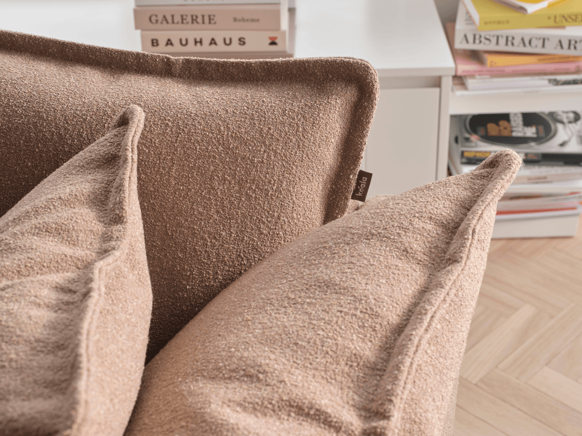 Koala Tamarama 6-section U-shape sectional in Pebble Beach, linen scatter cushions with sunlit art books