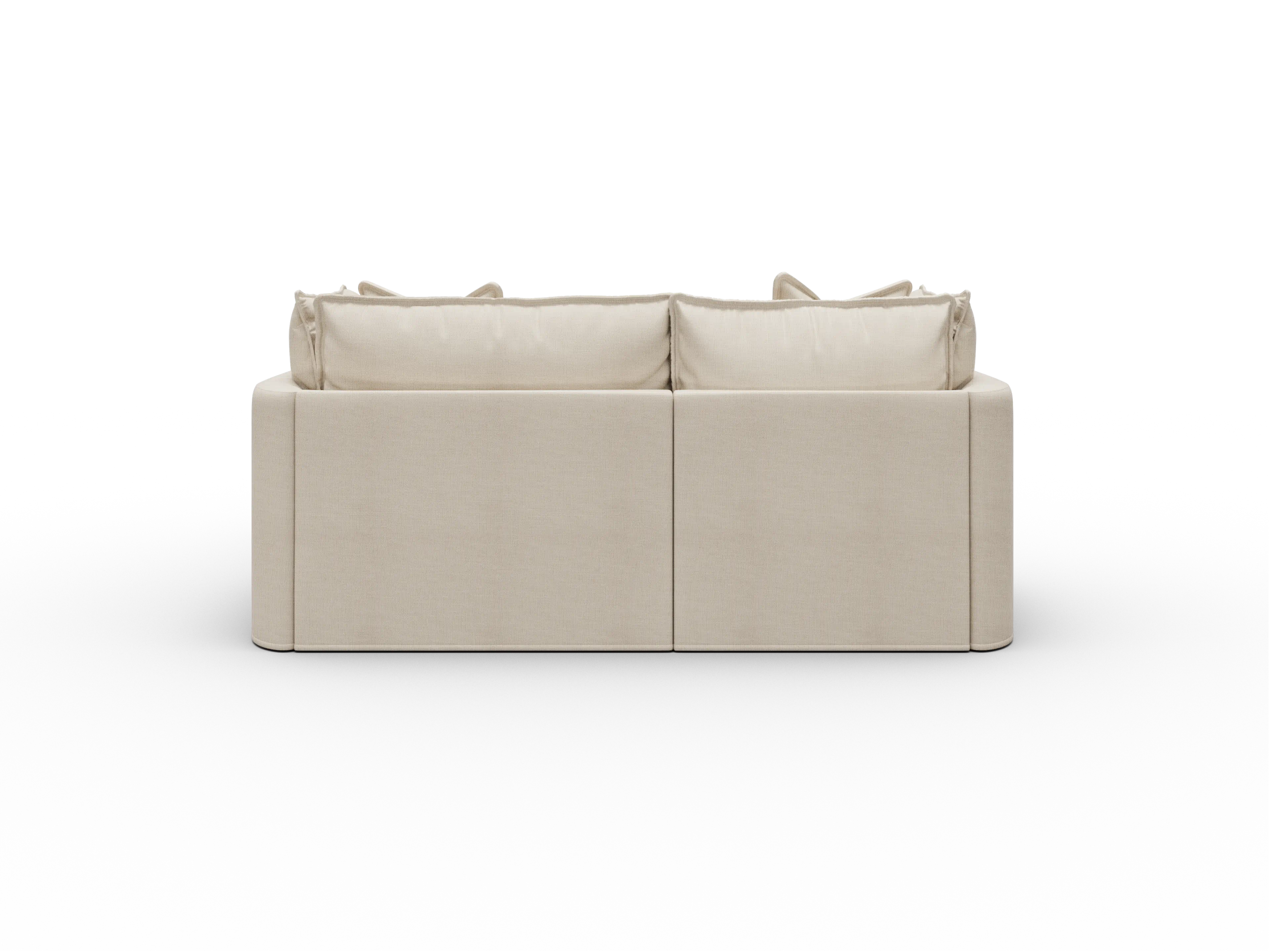 Koala Tamarama Washable Covers 2-section sofa with chaise in cream linen-look fabric on white