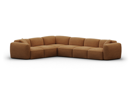 Luxurious L-shaped modular sofa in rich tan suede upholstery, featuring deep seats and plush cushions, perfect for a sophisticated living room setting.