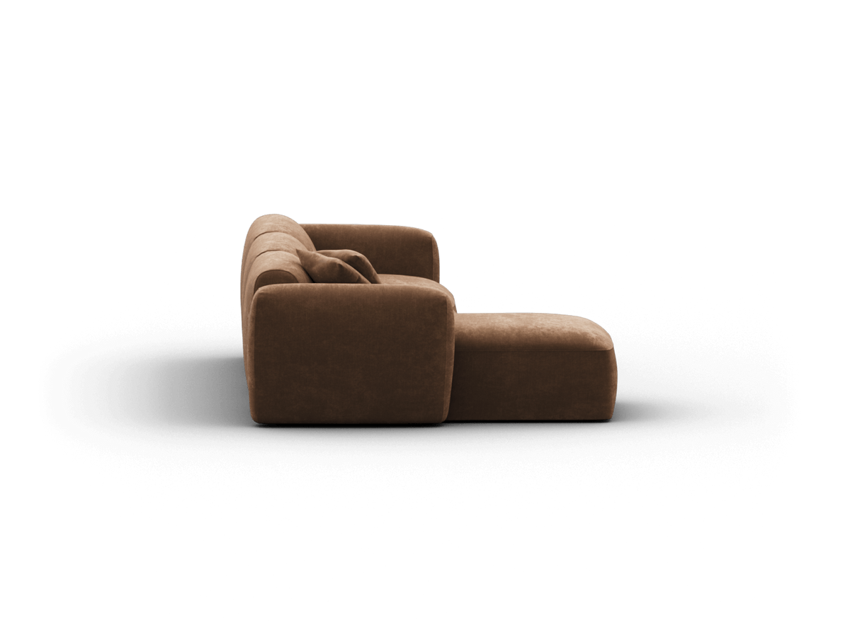 Premium modular brown velvet chaise lounge with plush cushions, featuring a minimalist design. Ideal for contemporary living spaces.