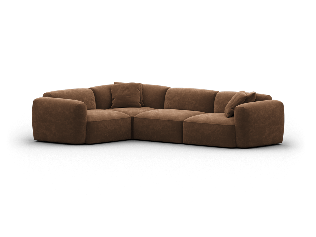 Luxurious L-shaped sofa upholstered in rich brown suede. Features plush cushioning and low-profile design, ideal for modern living rooms.