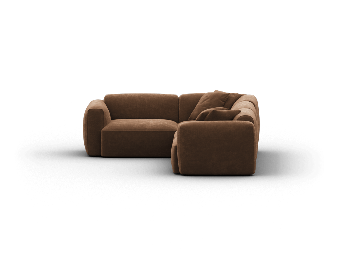 Luxurious brown velvet sectional sofa featuring deep cushions and a modern silhouette. Perfectly suited for a sophisticated living room setting.