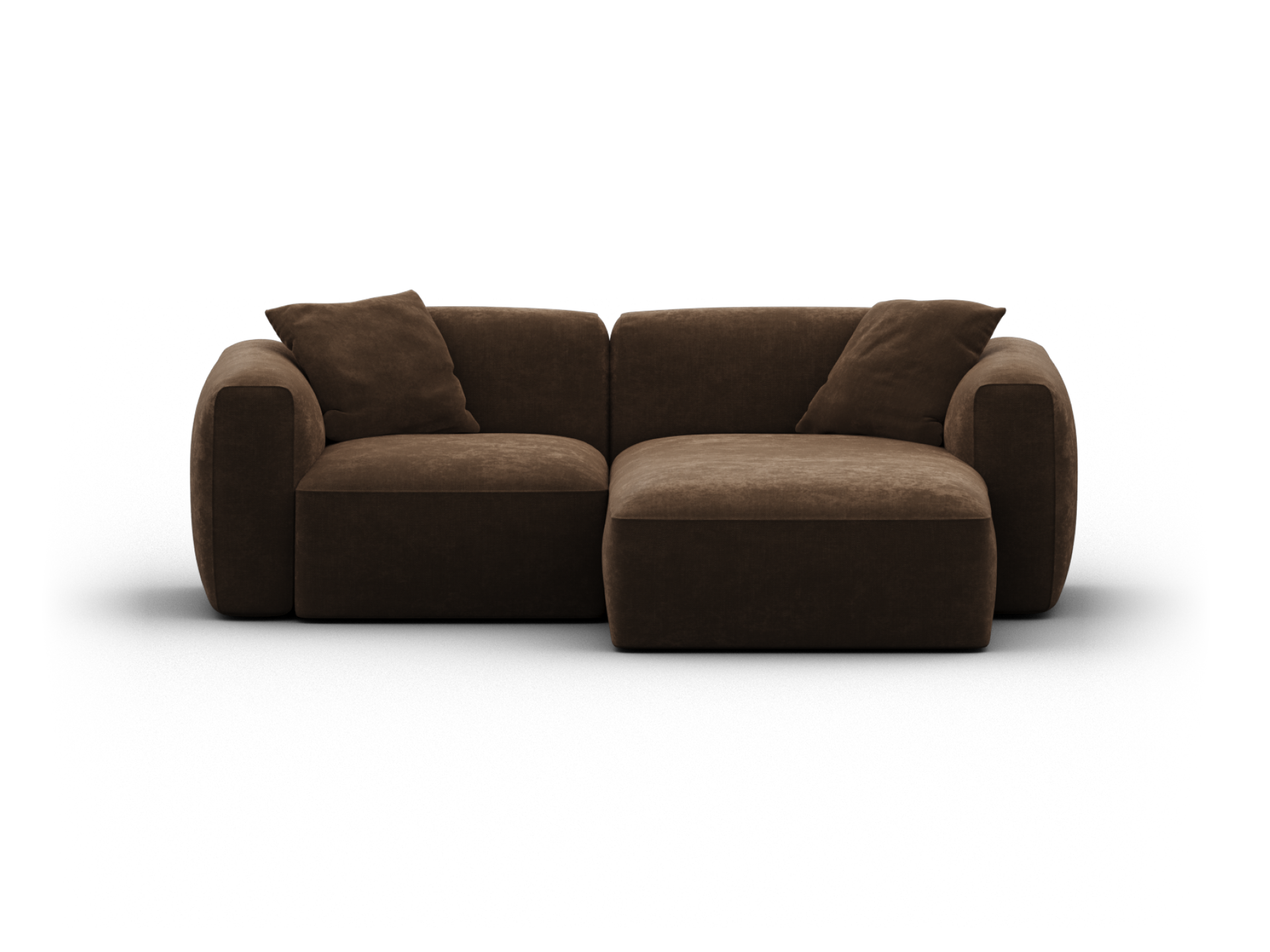 Luxurious brown velvet sofa, featuring deep cushions and a chaise lounge. Perfect for modern living rooms, exuding elegance and comfort.