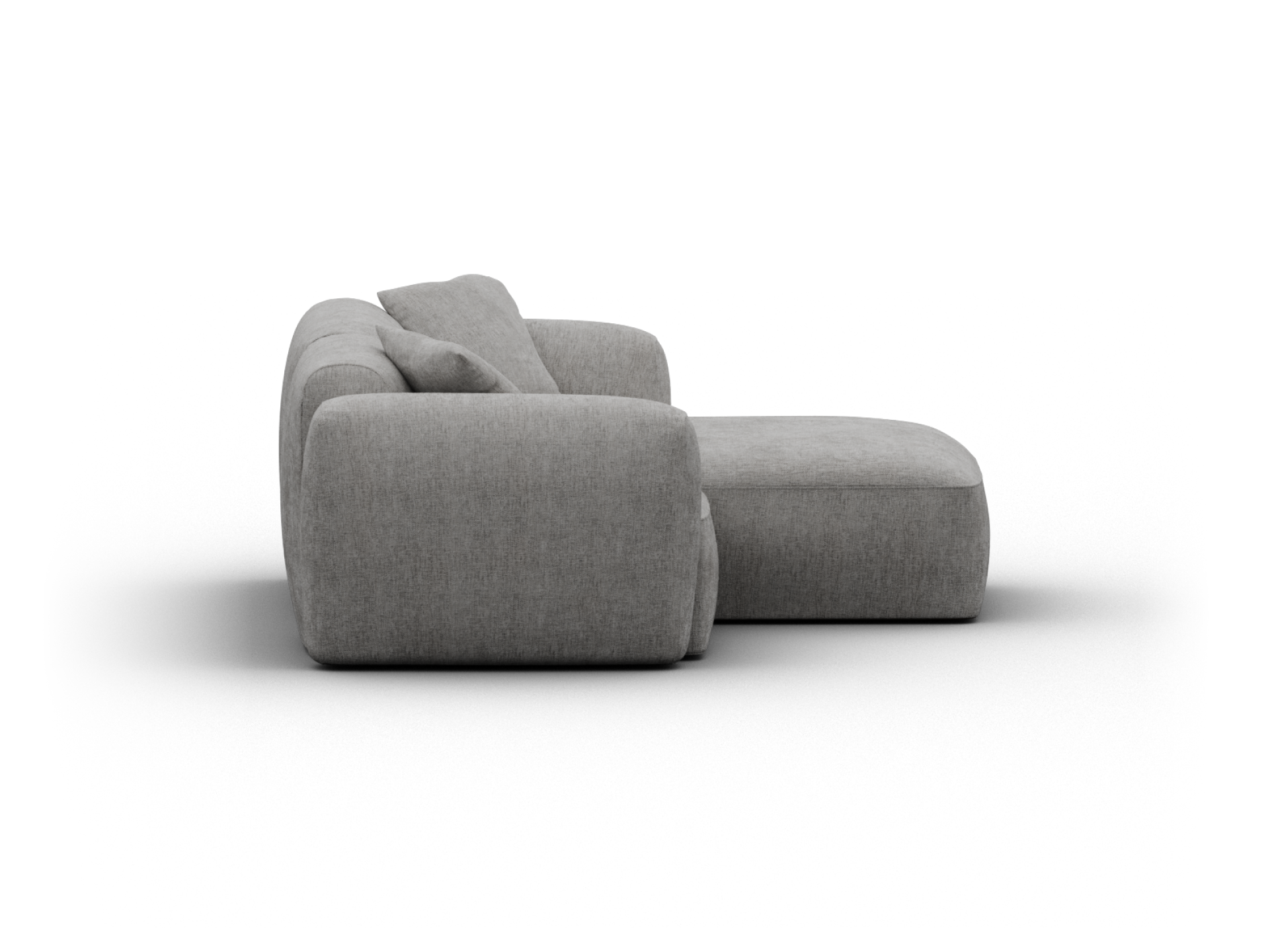 Luxurious grey fabric sectional sofa with plush cushioning and deep seating. Sleek, modern design perfect for a contemporary living room setting.