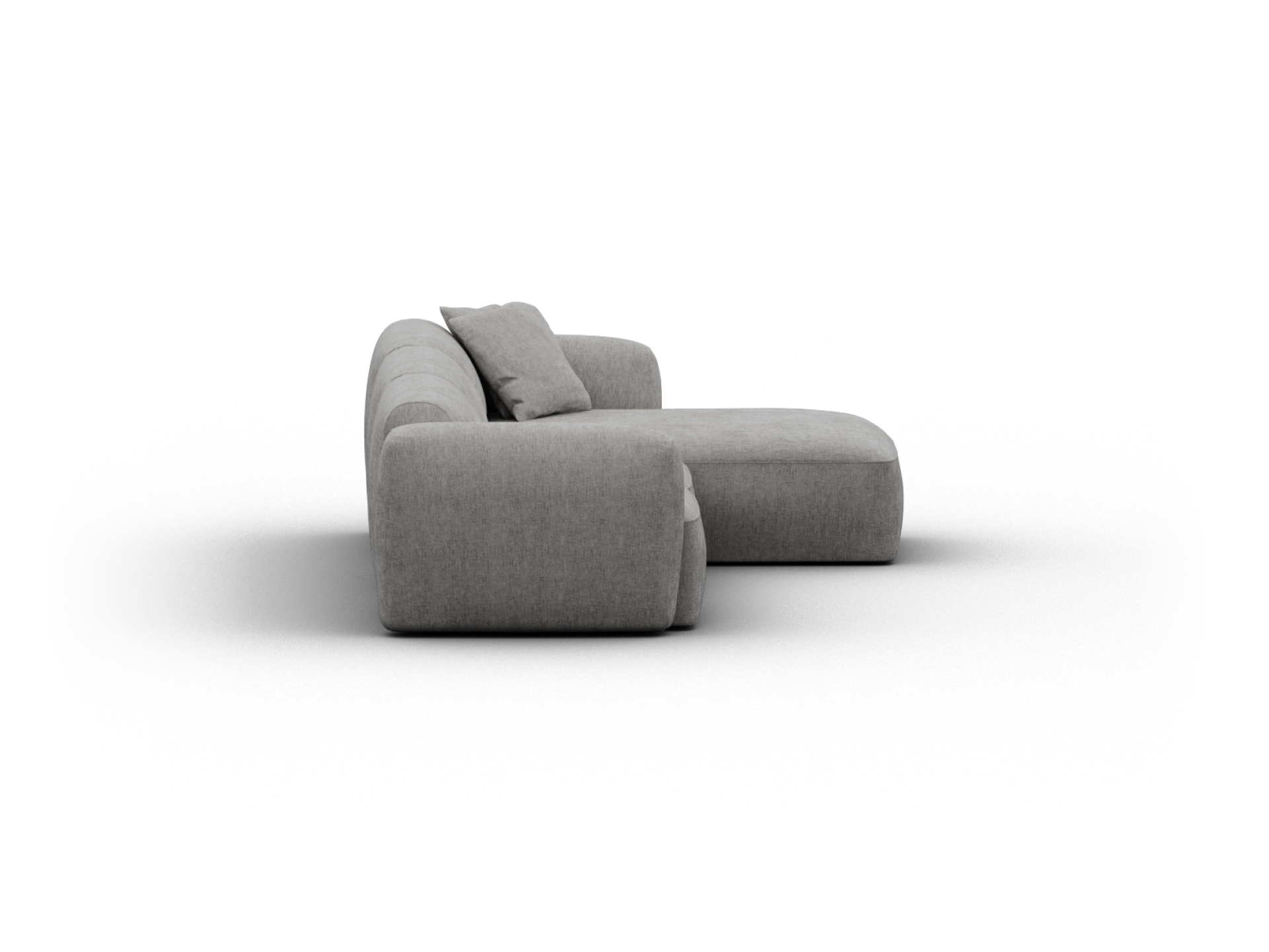 Modern grey sectional lounge with plush fabric, featuring deep cushions and a chaise extension. Ideal for sophisticated living spaces.