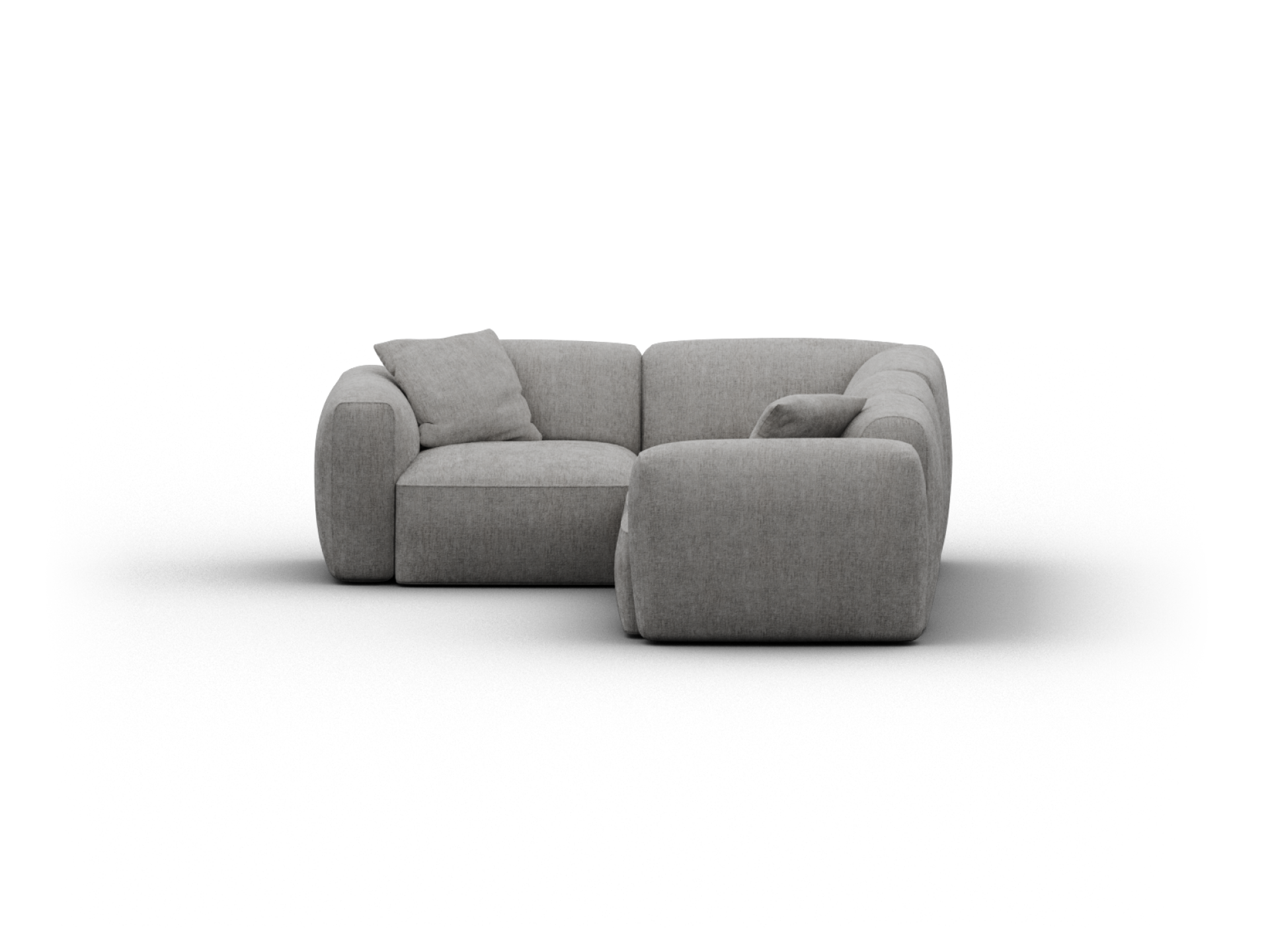 Luxurious sectional sofa in soft grey fabric, featuring plush cushions and rounded arms. Perfect for a modern living room with its chic, minimalist elegance.