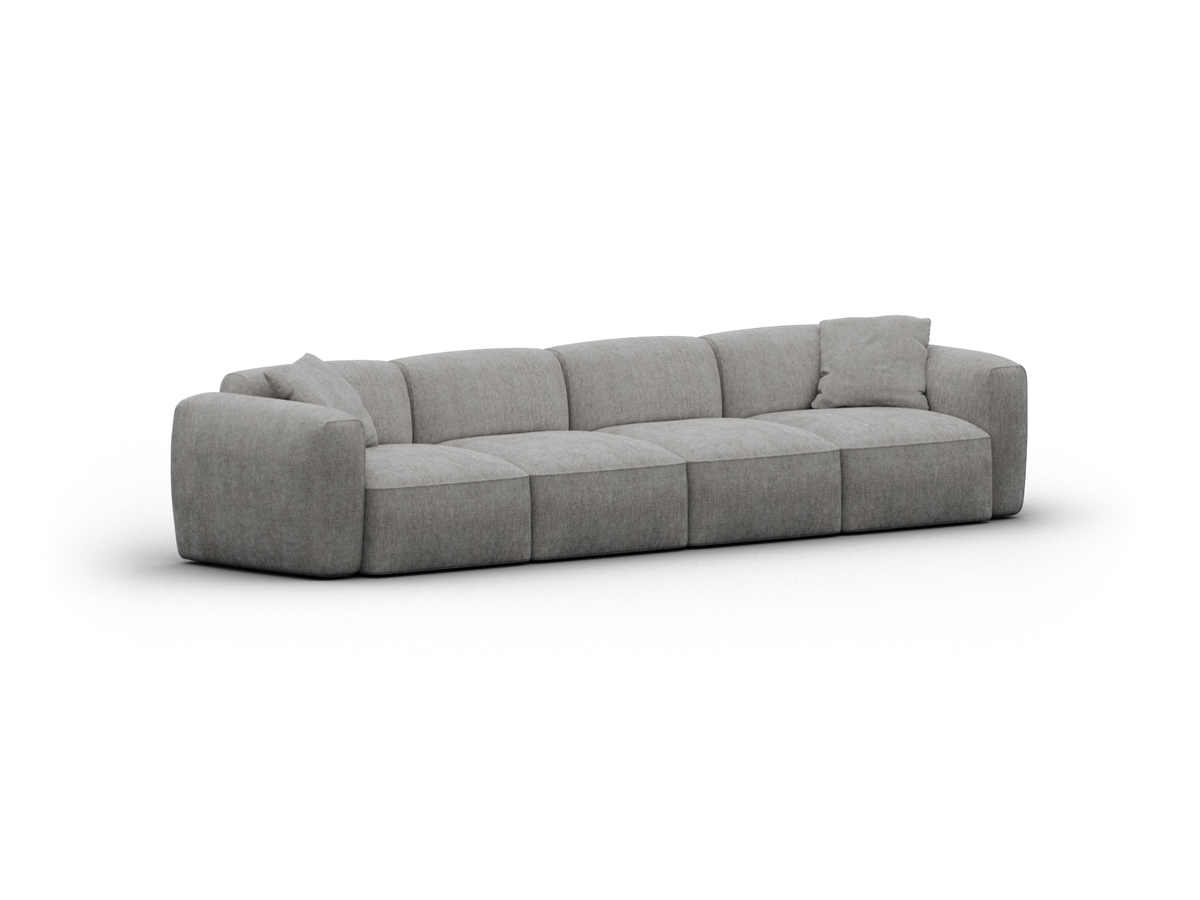Luxurious grey fabric sectional sofa with plush cushioning and contemporary design. Features deep seats, low-profile backrest, perfect for a chic living space.